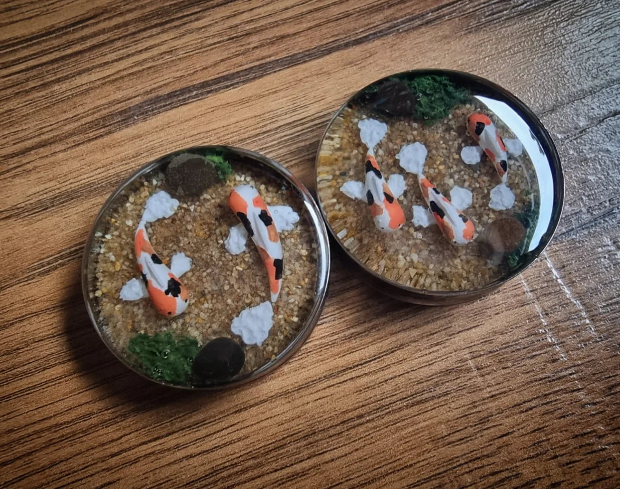 Koi fish pond plugs, polymer clay and resin in a stainless steel plug